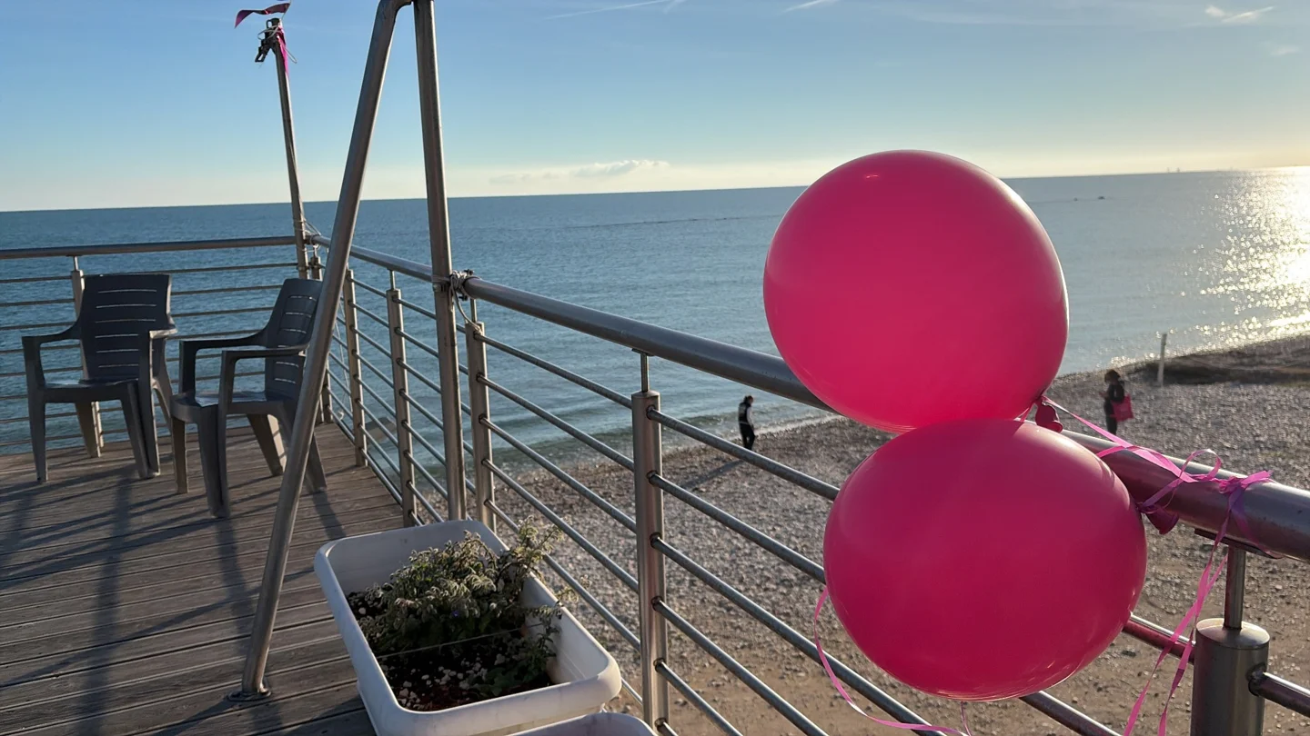 Pink balloons overlooking the sea in Fossacesia Marina